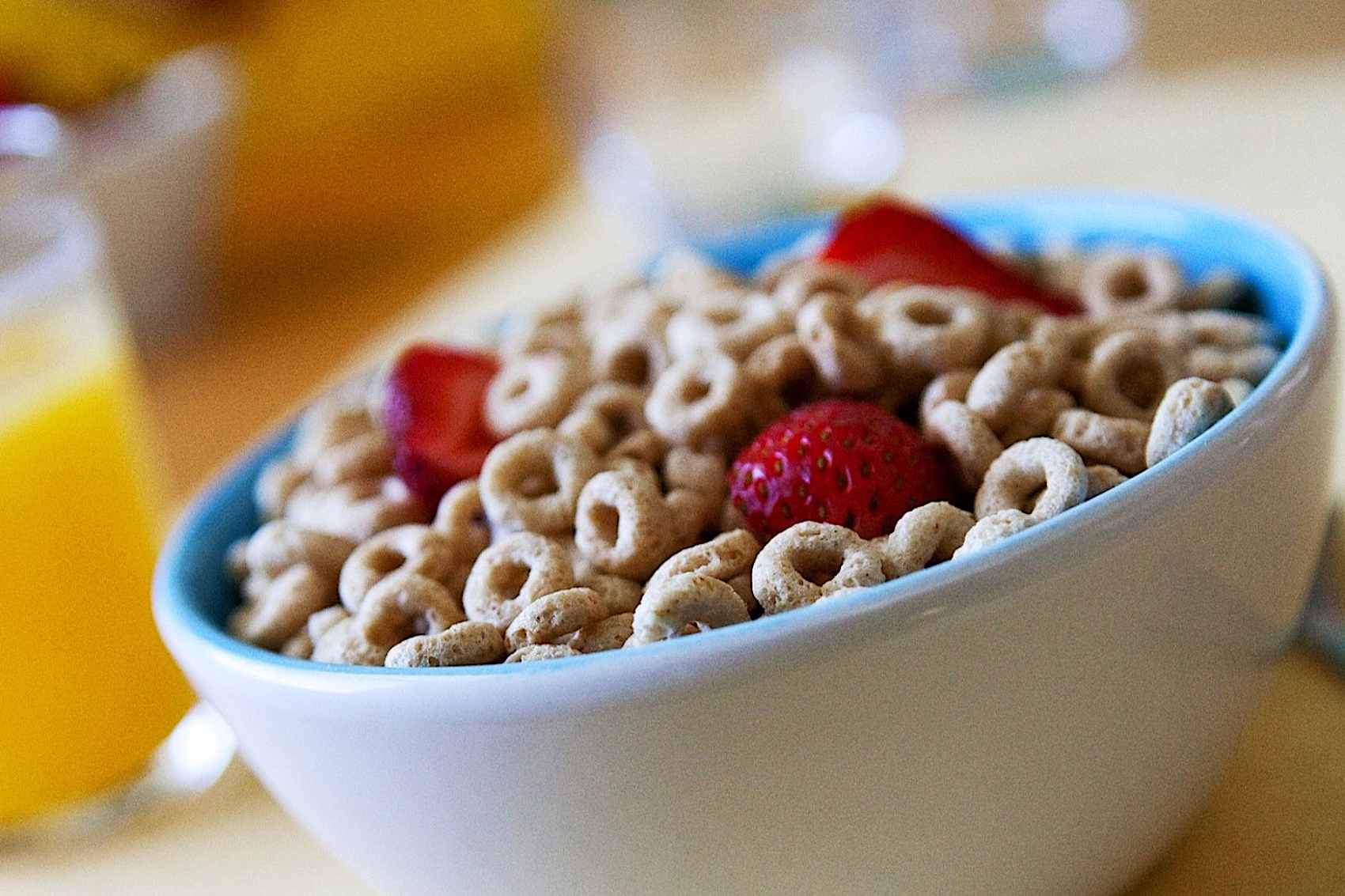 Bowl of Cheerios with strawberries